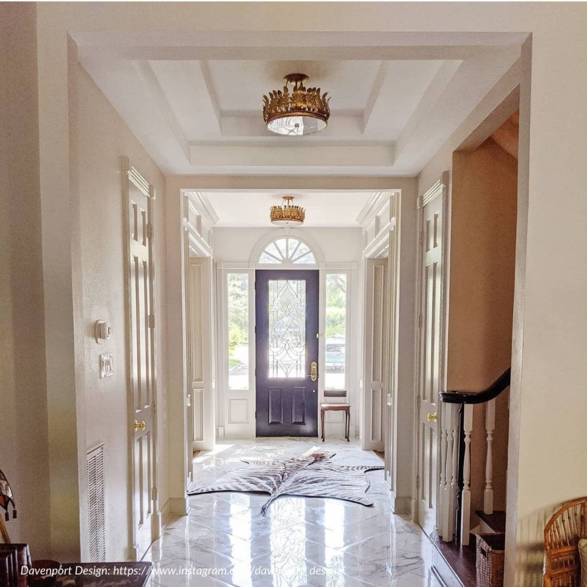 Adonis Semi-Flush Mount styled in a millwork ceiling. Styled view.
