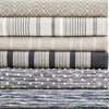 Annabelle Grey Indoor/Outdoor Rug styled with other rugs. Styled view.