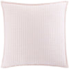 Light pink pillow. Styled view.