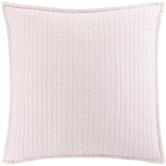 Light pink pillow. Styled view.