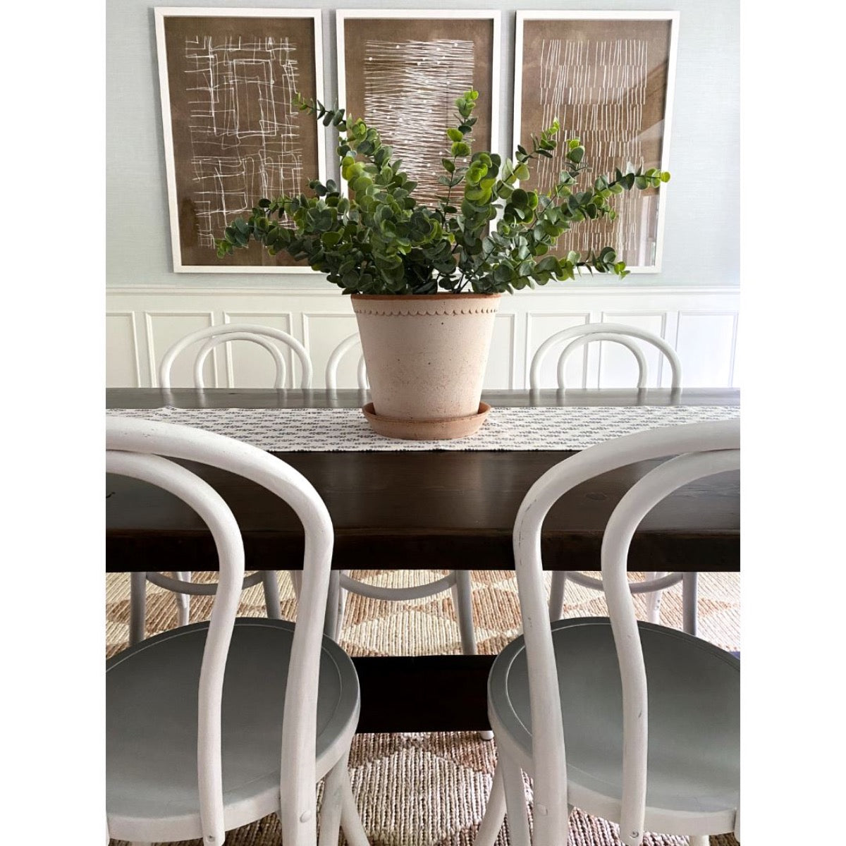 Burnt Umber Impressions I styled in a dining room. Styled view.