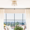 Caleb Flush Mount styled in a neutral living room with greenery. Styled view.