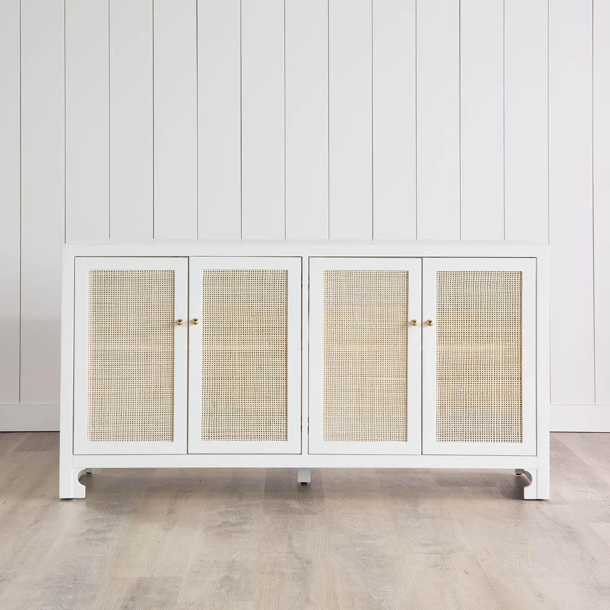 Colette Cabinet styled in a white room. Front view.