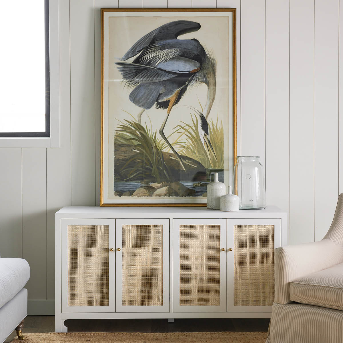 Colette Cabinet styled with heron artwork. Styled view.