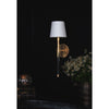 Auburn Crystal Sconce styled on a black wall above a dark surface. Styled view.