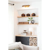 Devon Picture Light - Small styled above open shelving with decor. Styled view.