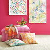 Dunes Bleached Oak Woven Jute Rug styled on a pink room with accessories. Styled view.