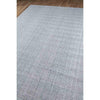 Edenbridge Rug - Grey over wood floor. Styled view.