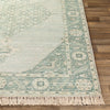 Ella Rug on a light wood floor. Styled view.