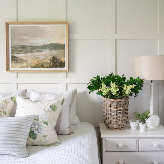 Evening View styled in a white bedroom. Styled view.
