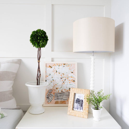 Fashion Floral styled on a white bedside table. Styled view.