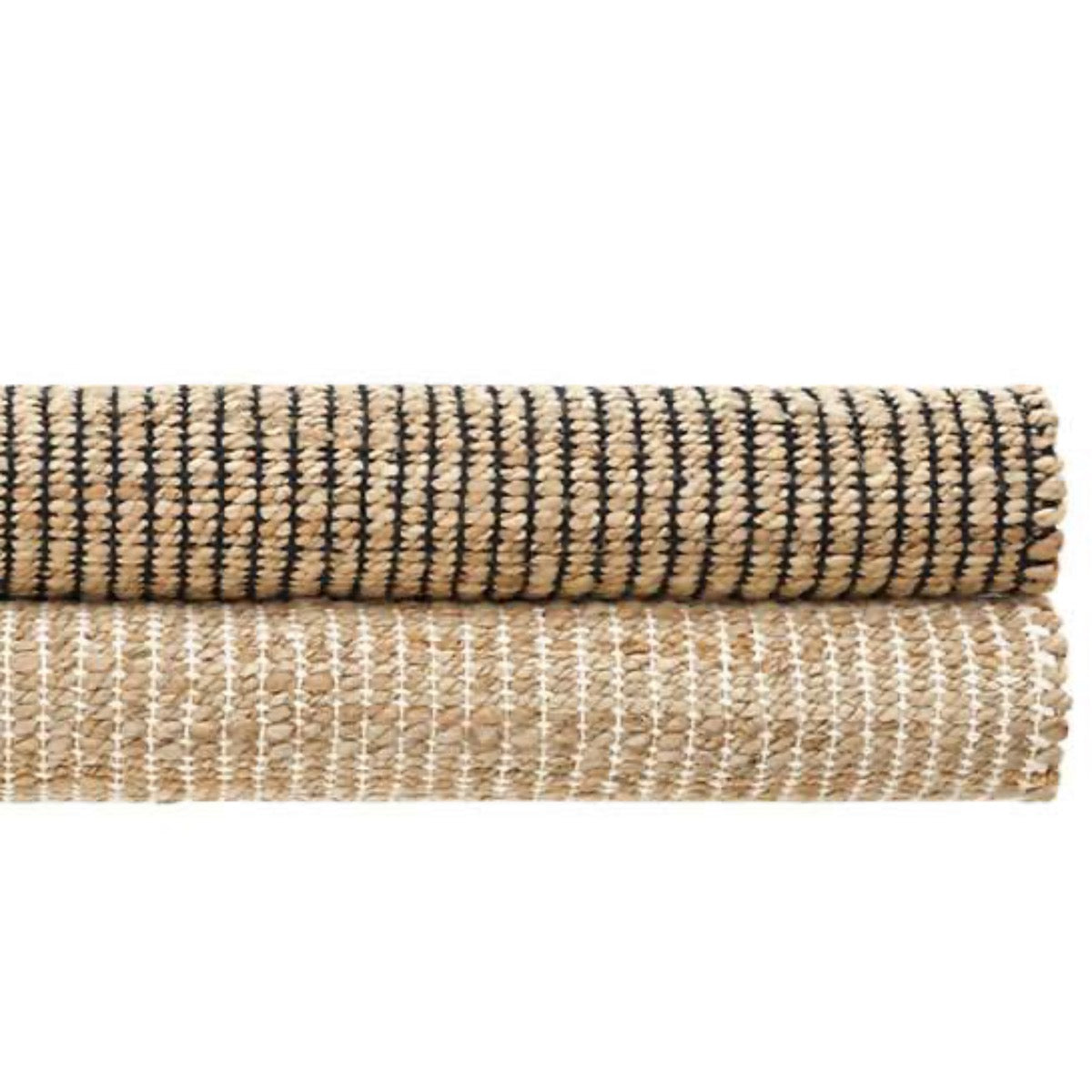 Gridwork Black Woven Jute Rug styled with a neutral rug. Styled view.