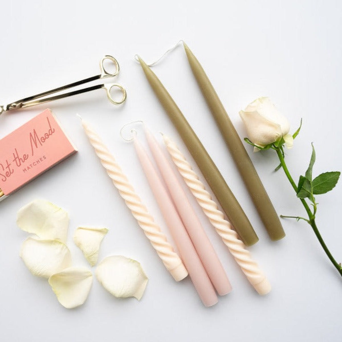Hand-Dipped Danish Tapers - Olive styled with candles and matches. Styled view.