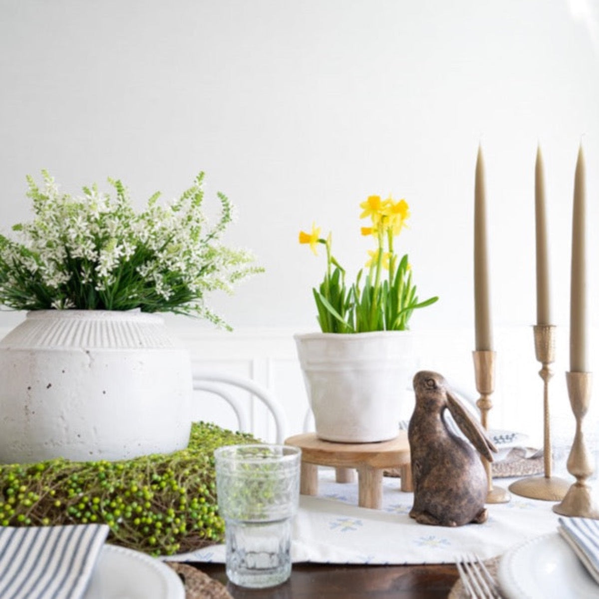 Hand-Dipped Danish Tapers - Olive styled with greenery and spring dining set. Styled view.
