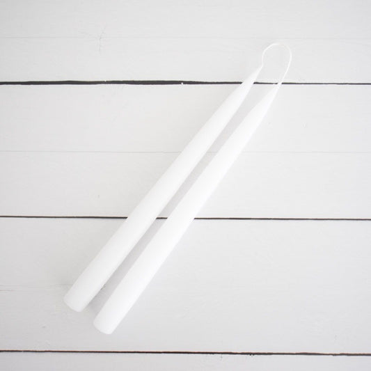Hand-Dipped Danish Tapers - White styled on a white back. Styled view.