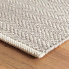 Herringbone Dove Grey Woven Cotton Rug corner detail. Close-up detail view.