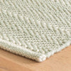Herringbone Ocean Woven Cotton Rug corner detail. Close-up detail view.