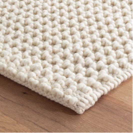 Hooper Woven Wool Rug corner detail. Close-up detail view.