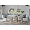 Perennial Lantern styled over a dining table in a white room. Styled view.
