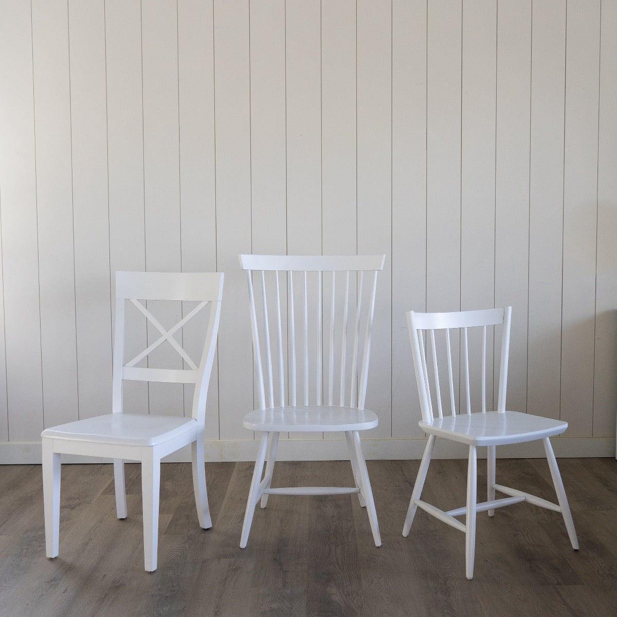 Kennedy Dining Chair styled with white dining chairs. Styled view.