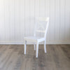 Kennedy Dining Chair in Opaque White. Left angle view.