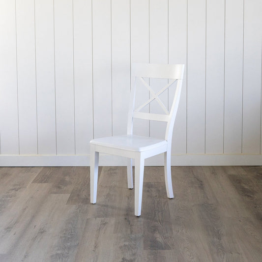 Kennedy Dining Chair in Opaque White. Left angle view.