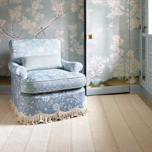 La Mirada Wheat Woven Cotton Rug styled in a victorian blue room. Styled view.