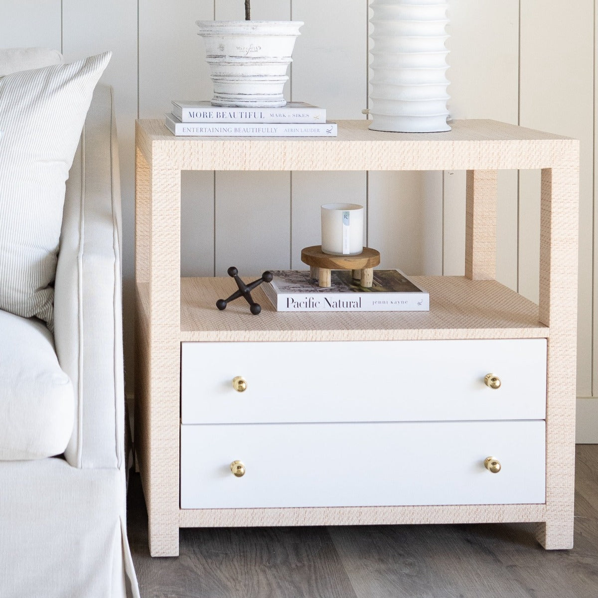 Leta Teak Stand styled with candle in a side table. Styled view.