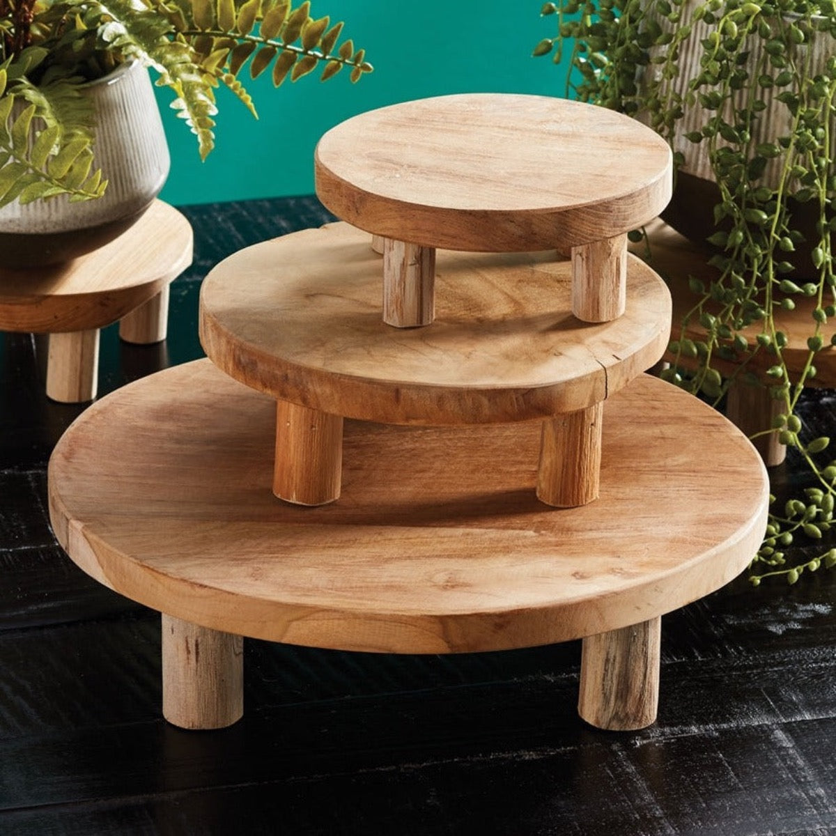 Leta Teak Stand stacked atop each other. Styled view.