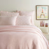 Lush Linen Slipper Pink Duvet Cover styled with pink sheets. Styled view.