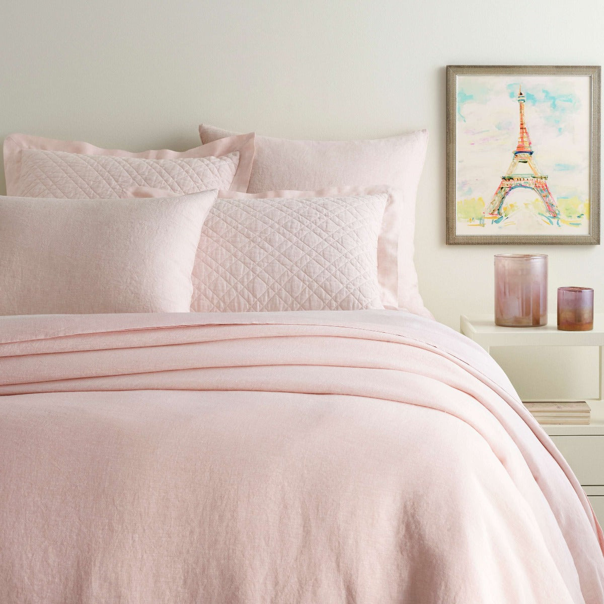 Lush Linen Slipper Pink Duvet Cover styled with pink sheets. Styled view.