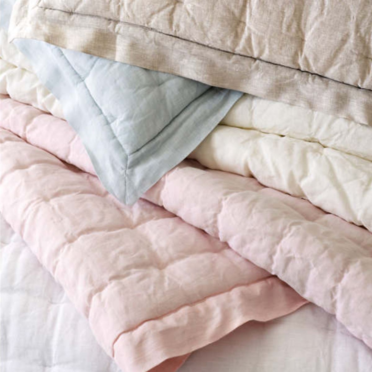 Lush linen puff bedding. Styled view.