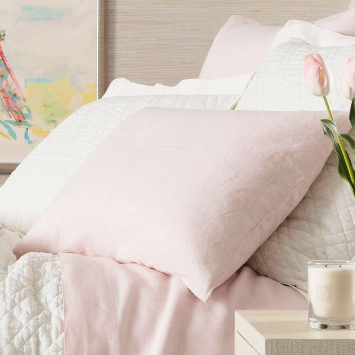 Lush Linen Slipper Pink Sham styled with white bedding. Styled view.