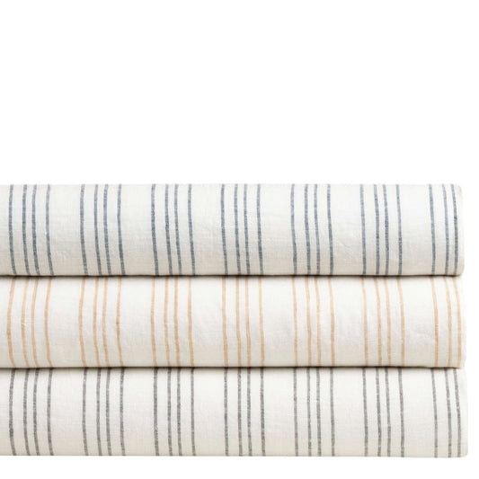 Lush Linen Stripe Slate Blue Duvet Cover styled with like duvets. Styled view.