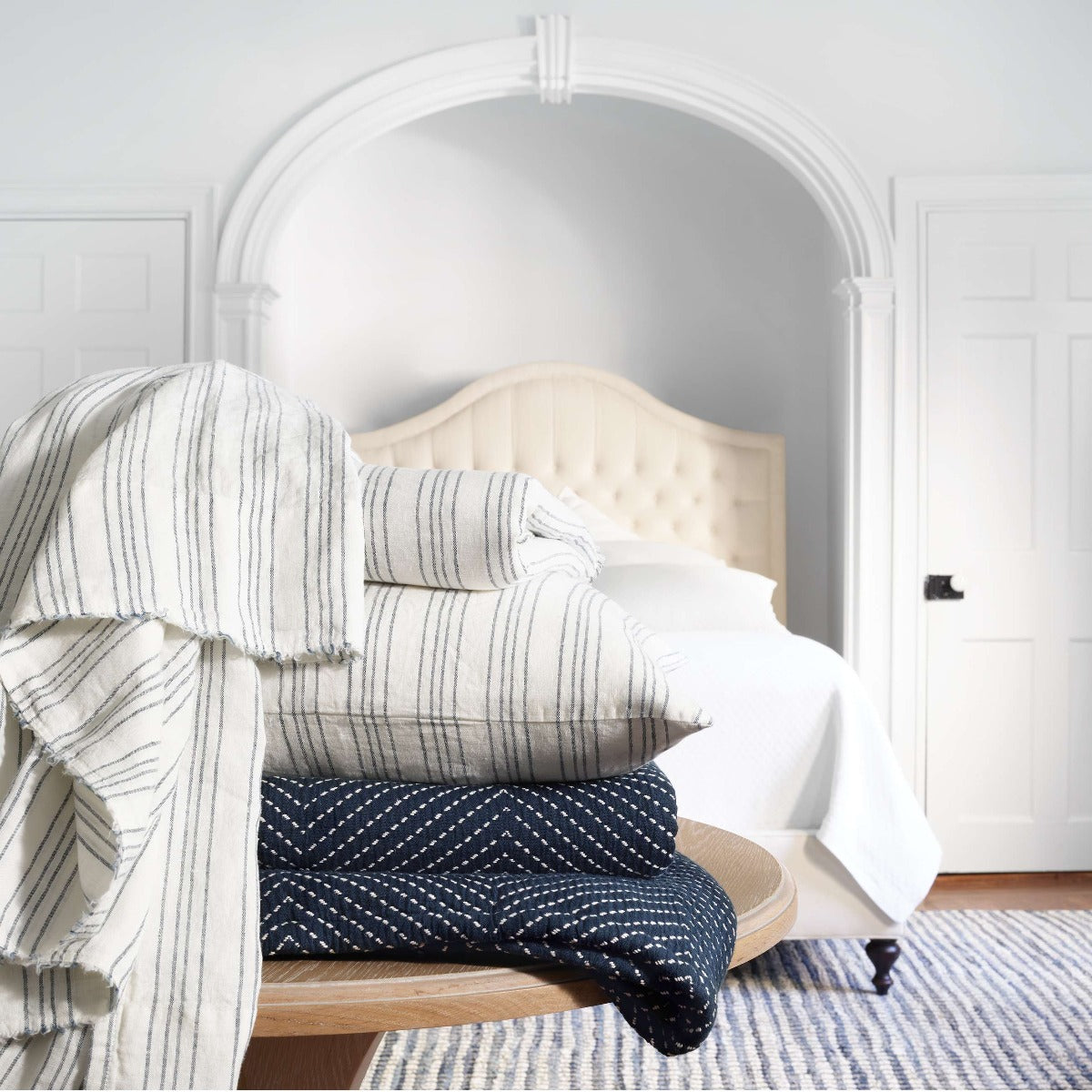 Lush Linen Stripe Slate Blue Duvet Cover styled in a neutral bedroom. Styled view.