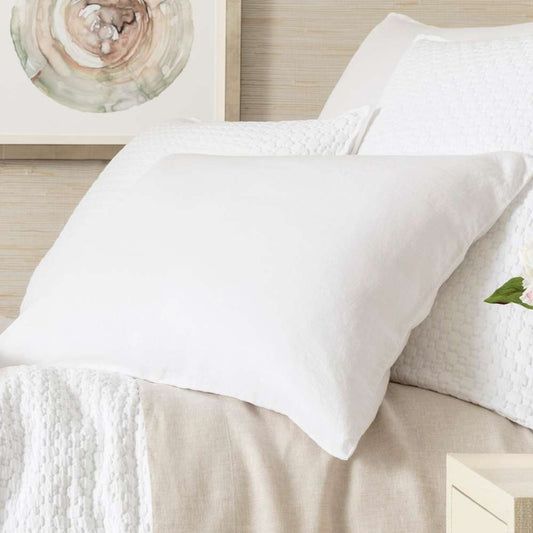 Lush Linen White Sham styled with neutral bedding. Styled view.