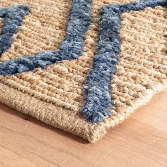 Marco Navy Jute Soumak Woven Rug corner detail. Close-up detail view.