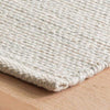 Marled Light Blue Woven Cotton Rug corner detail. Close-up detail view.