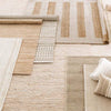Milo Ivory Woven Jute/Cotton Rug styled with neutral rugs. Styled view.