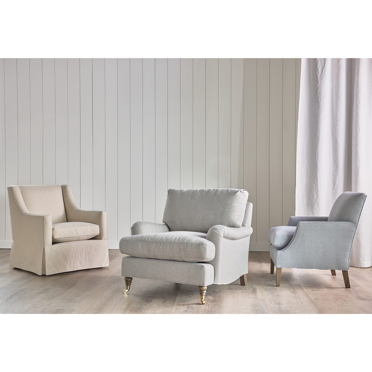 Owen Chair styled with 2 arm chairs. Styled view.