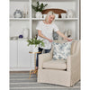 Owen Chair styled with blue pillows, blue rug and blue decor. Styled view.