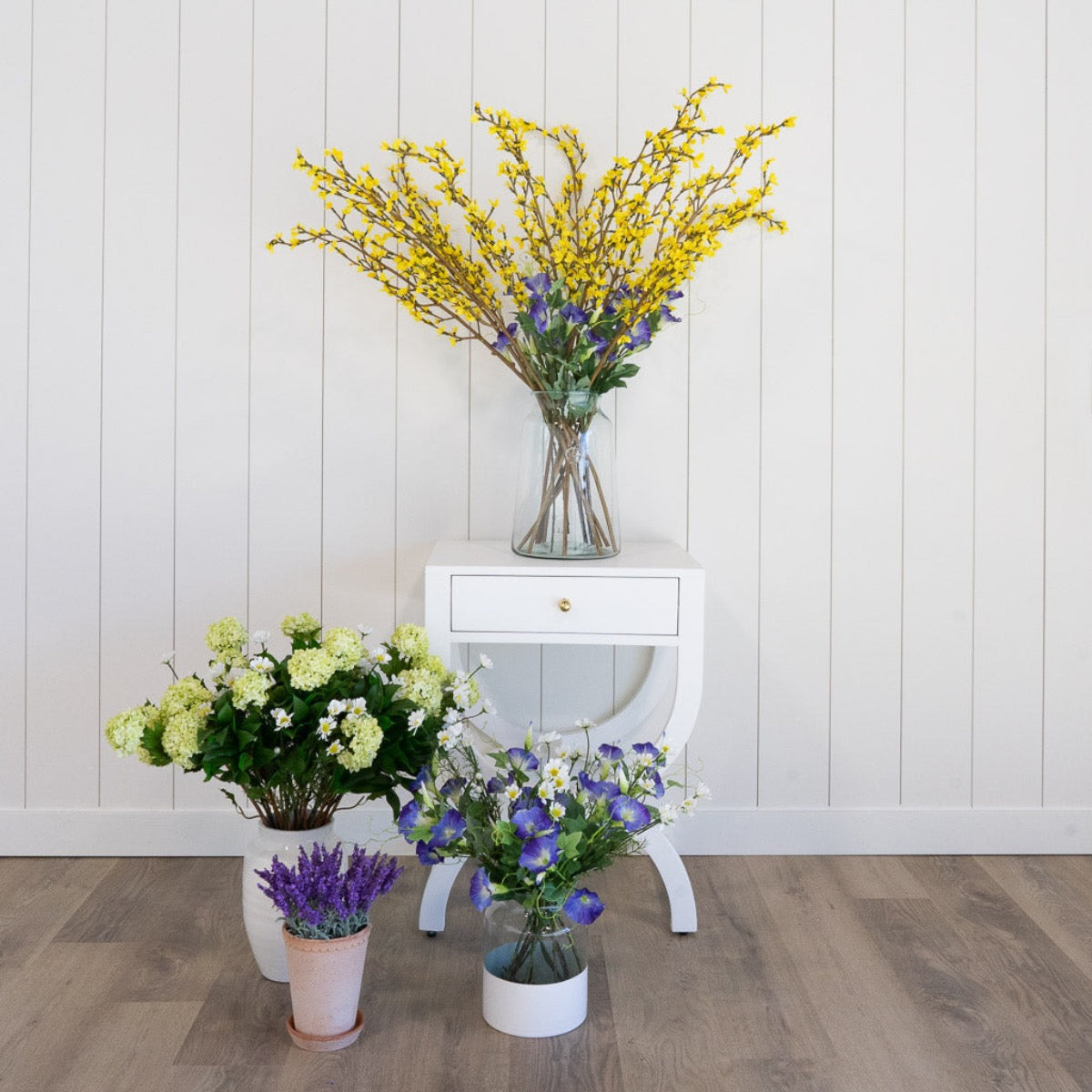 Paige Side Table styled with vases and greenery. Styled view.