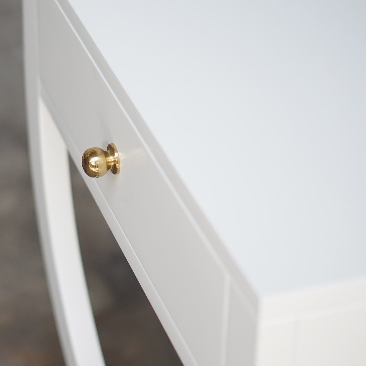 Paige Side Table handle. Detail view.