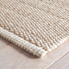 Pebble Natural Indoor/Outdoor Rug corner detail. Close-up corner view.