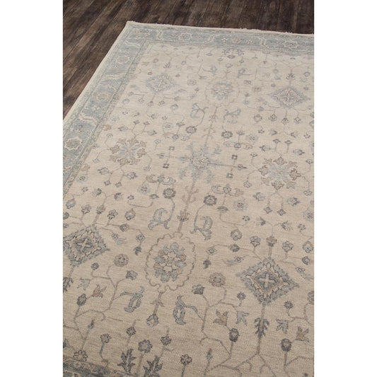 Pembroke Hand-Knotted Rug styled on wood floor. Styled view.
