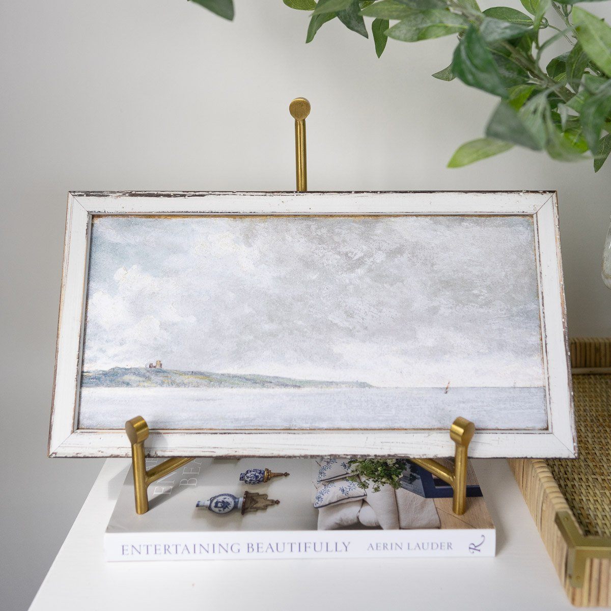 Petite Scapes - Coastal Scene with Cliffs styled in brass easel. Styled view.