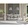 Augustine Outdoor Pendant - Large styled above an outdoor dining table with bar doors. Styled view.