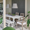 Augustine Outdoor Pendant - Large styled above a neutral table with lime baskets. Styled view.
