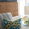 Riviera King Headboard styled with blue and green throw pillows. Styled view.