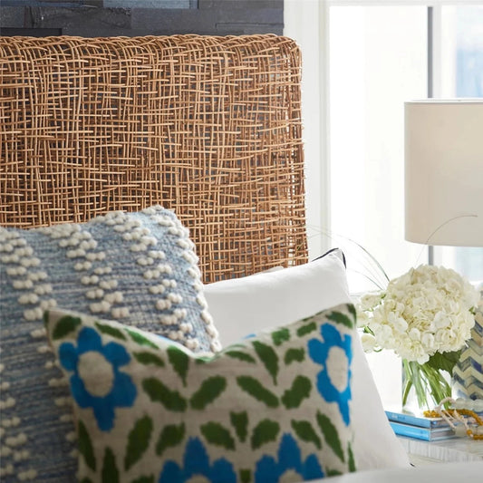 Riviera Queen Headboard styled with blue and green throw pillows. Styled view.